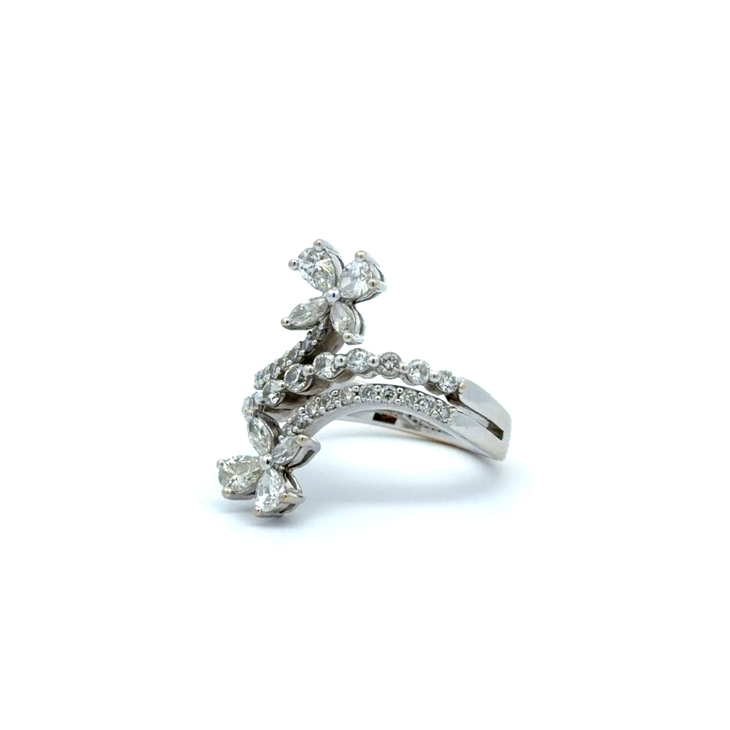 Diagonal view of white gold ring with diamond accents on a white background