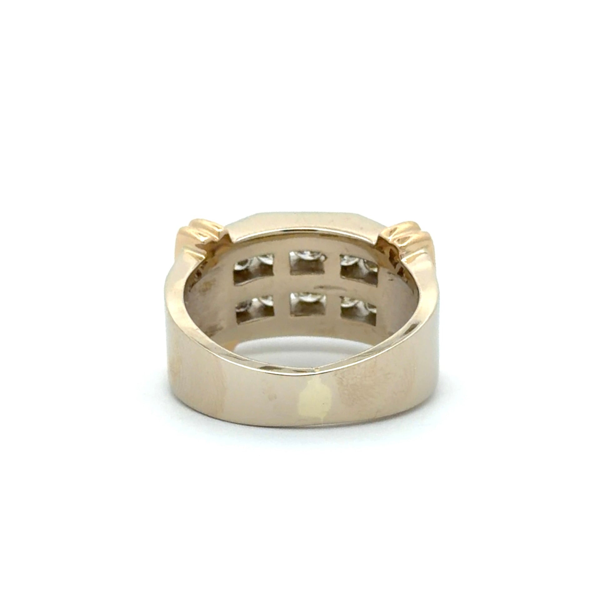Back of white and yellow gold ring on a white background
