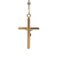 A gold cross pendant necklace with a polished finish, suspended from a gold chain shown against a plain white background.