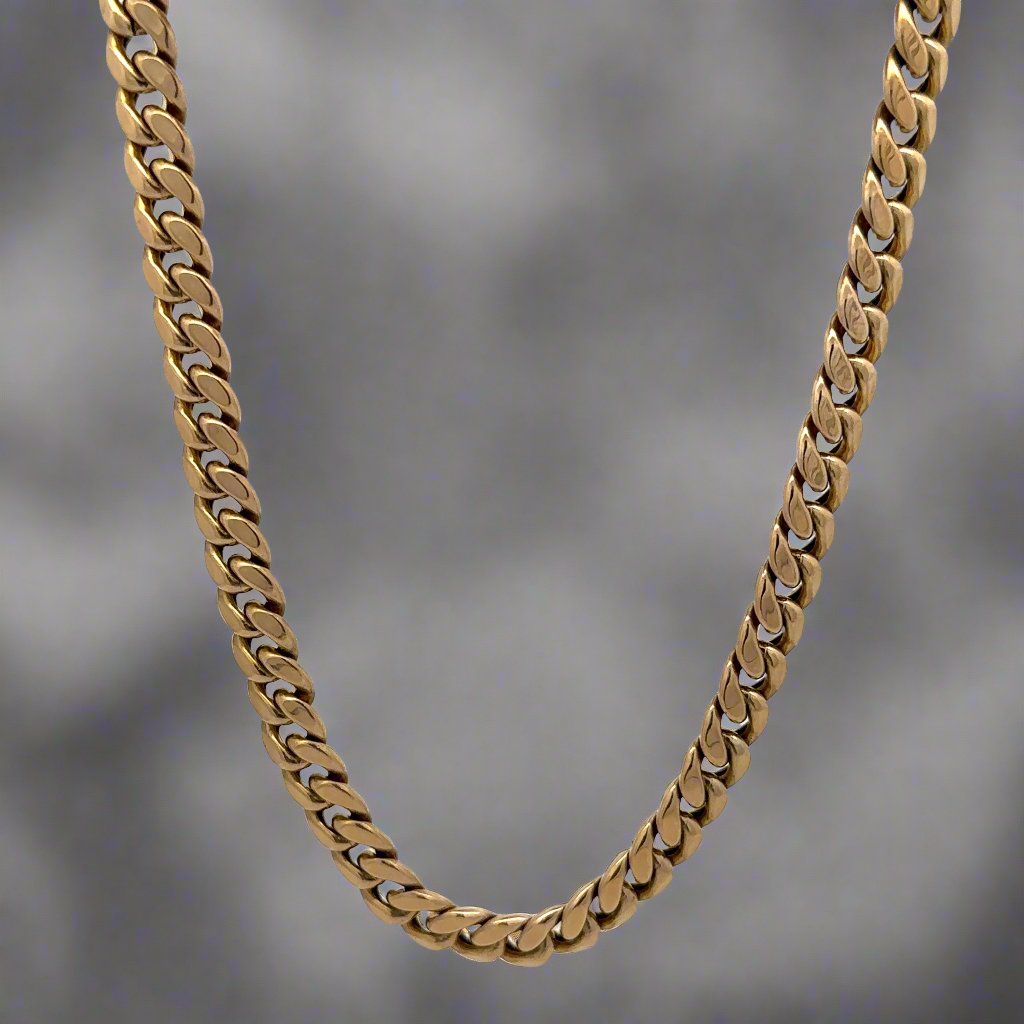 Back of yellow gold Cuban link chain