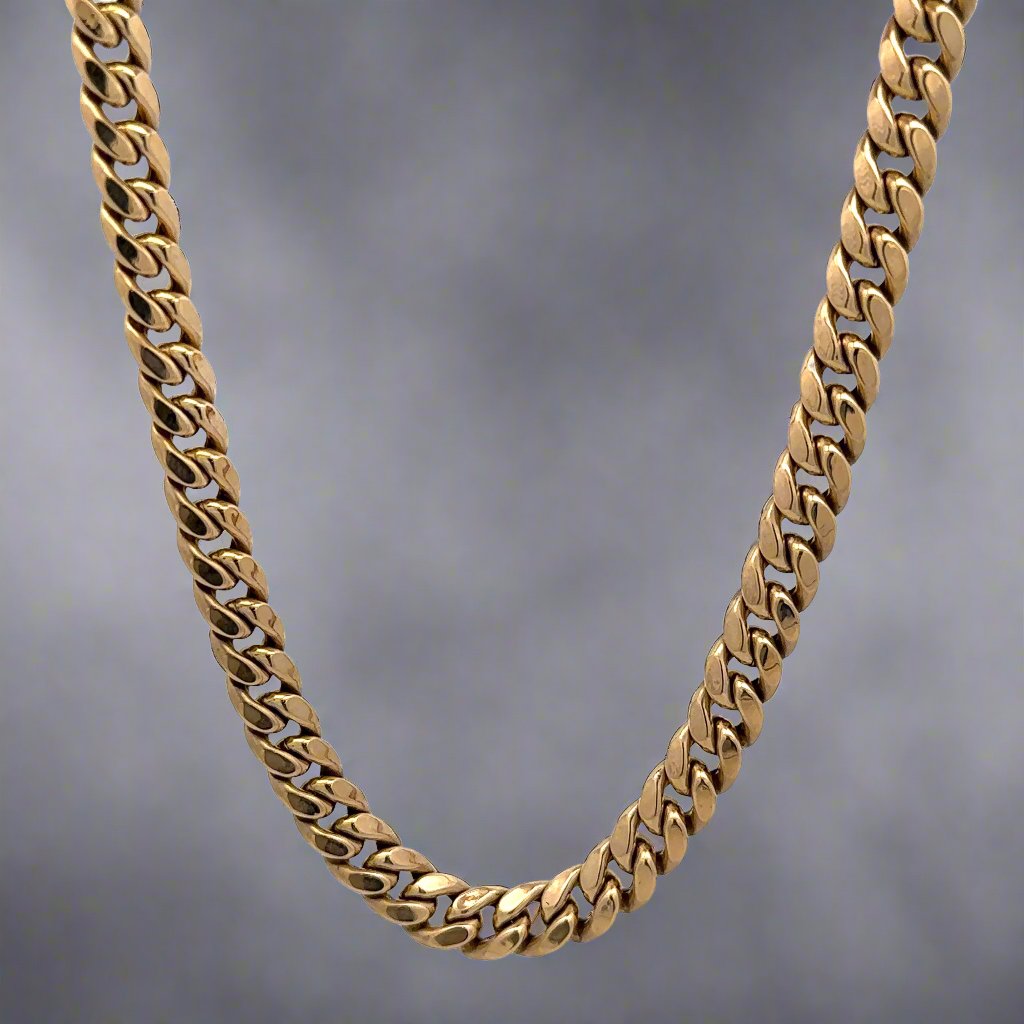 Front of yellow gold cuban link chain