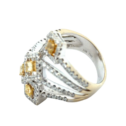 A white gold ring with diamonds shown on a plain white background with 18K 750 stamp