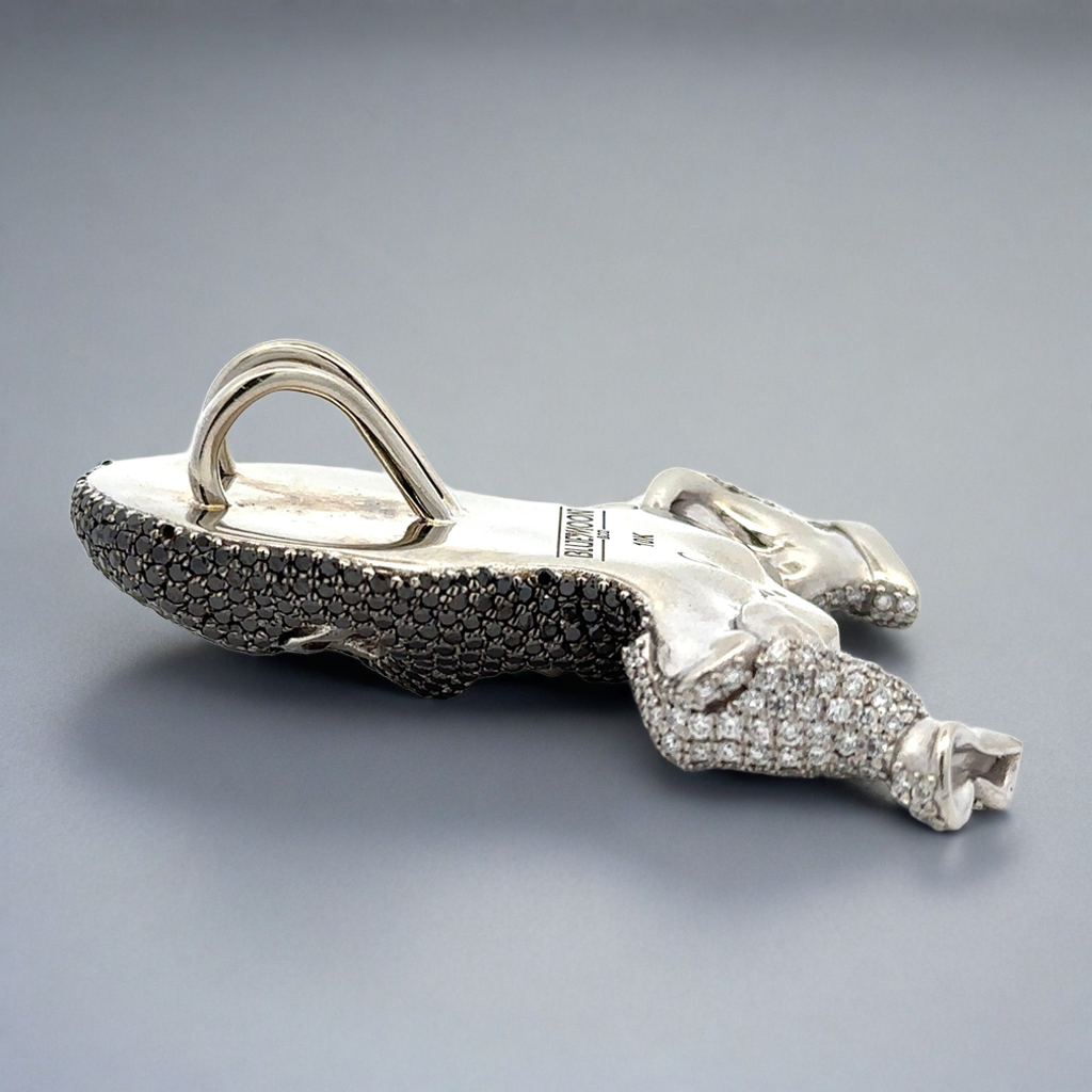 Ski mask face diamond pendant resembling a mask with gemstone details on a gray background