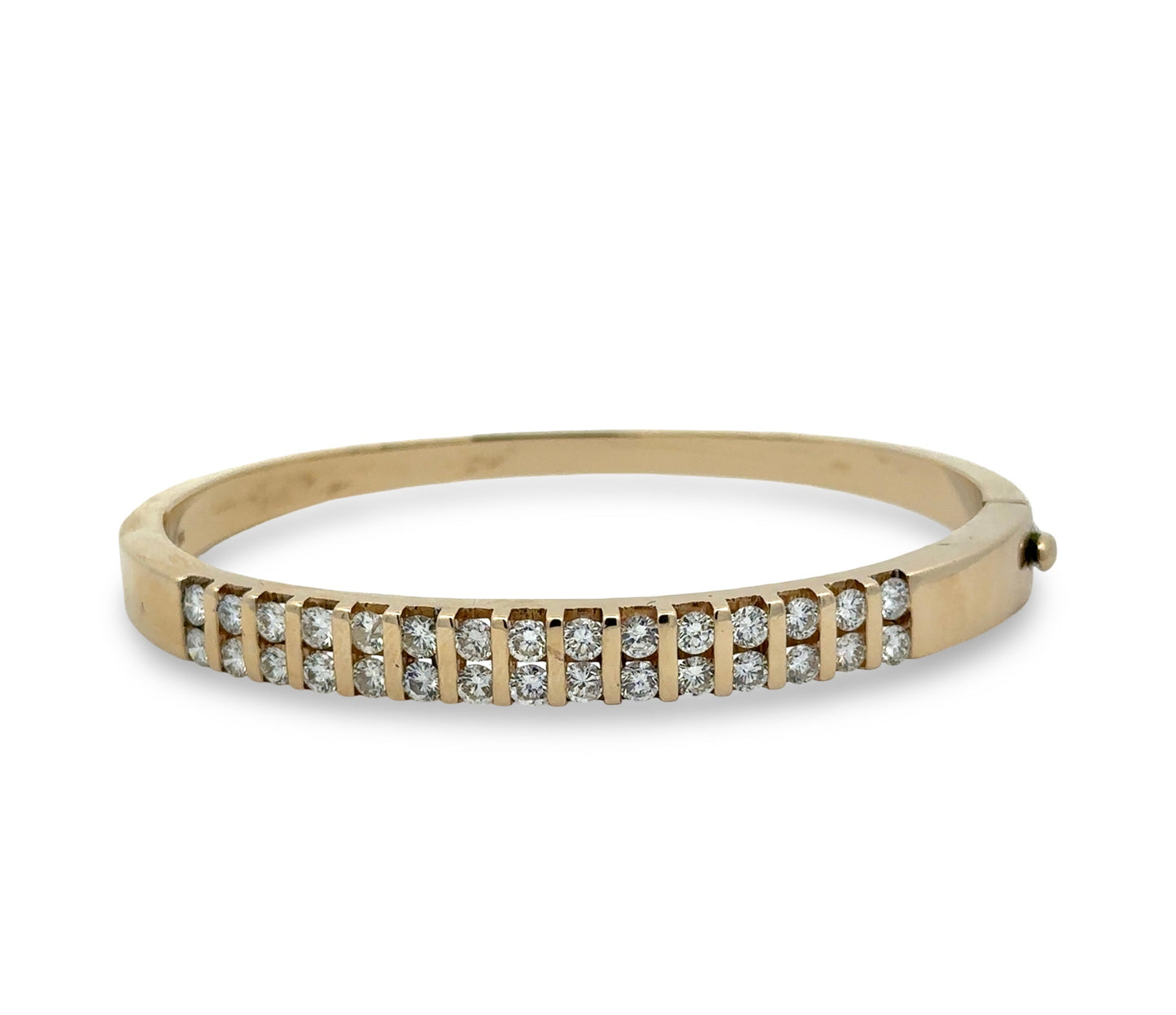 Gold bracelet with diamonds on a white background