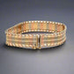 Back of tri color gold bracelet with safety lock