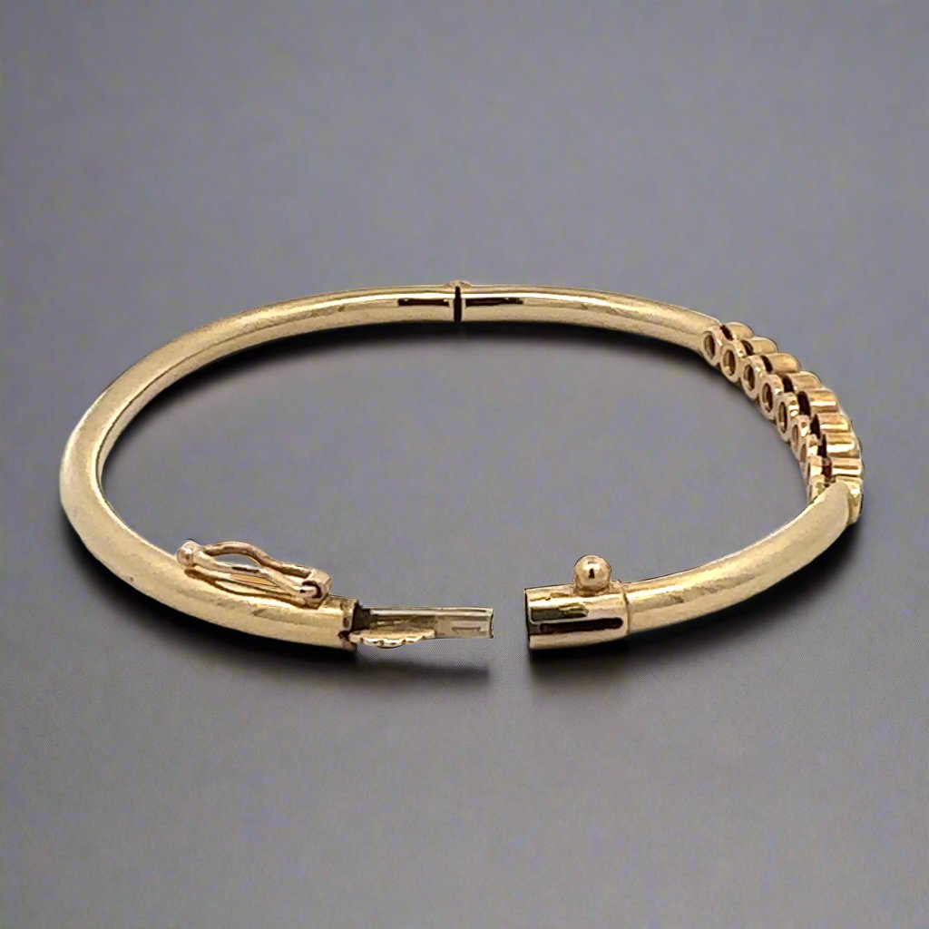 Open bracelet with box clasp and safety lock