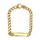 Gold ID bracelet on white background