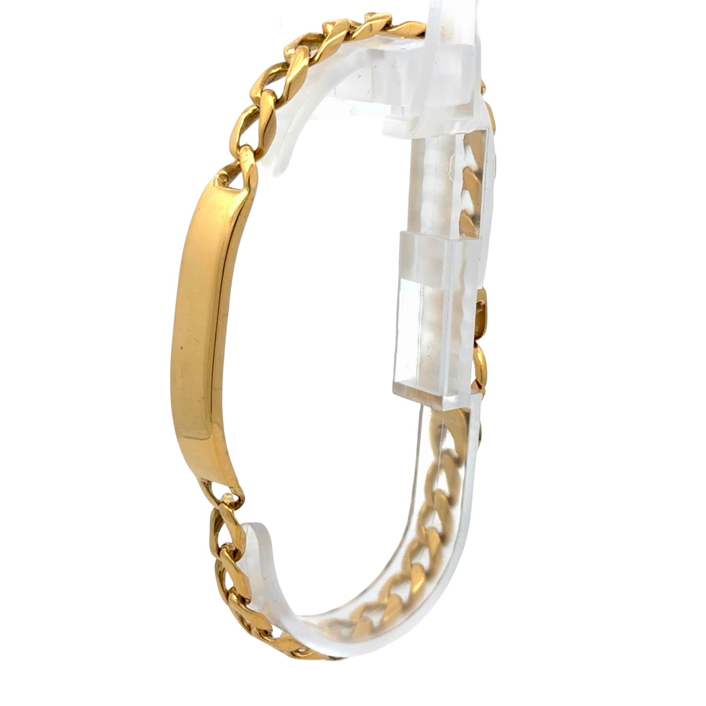 Gold ID bracelet on white background
