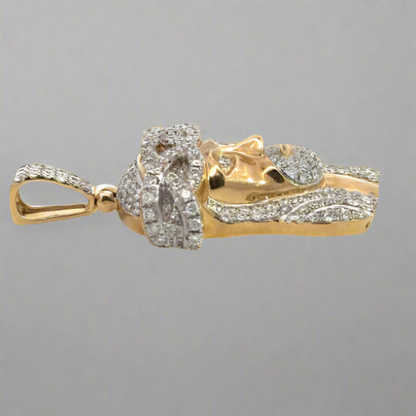 Side of the diamond jesus pendant with a square bail