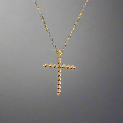 back of yellow gold diamond cross