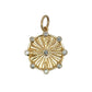 Gold compass pendant with diamond accents on a white background