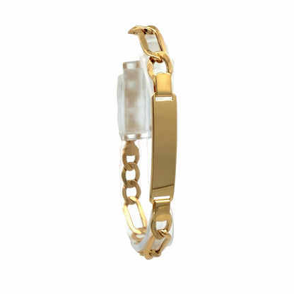 Angled view of 14K yellow gold ID bracelet showing polished plate and link chain