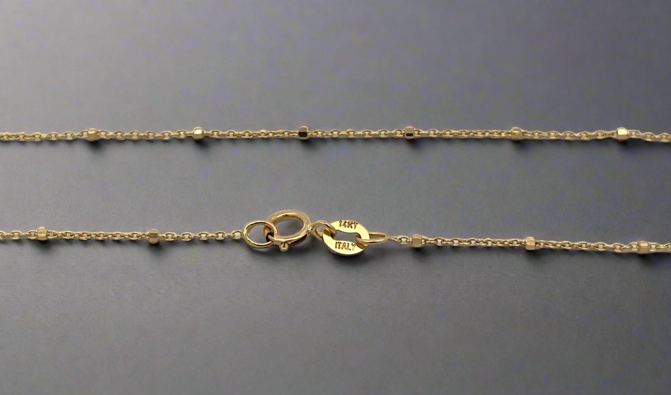 Spring ring clasp with 14K stamp and small beads on link necklace