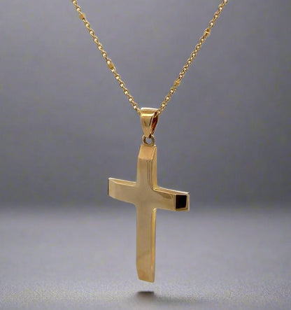 Diagonal view of cross necklacre