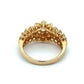 Gold ring with a decorative design on a white background
