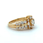 Gold ring with diamonds on a white background