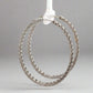 Side of white gold hoops