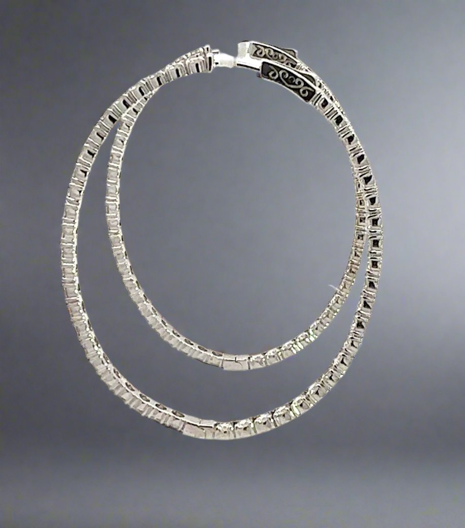 Side of white gold hoops with lock