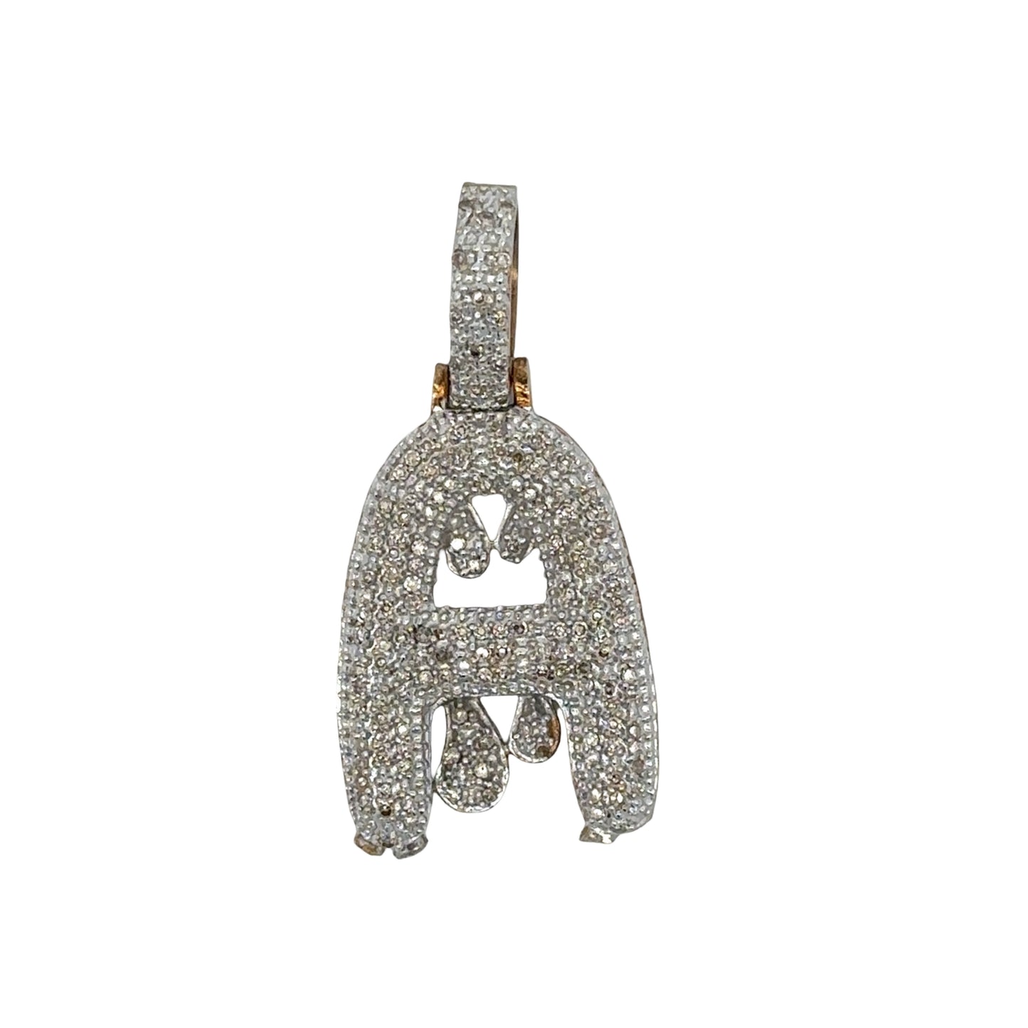A pendant with diamond chips and drippy design