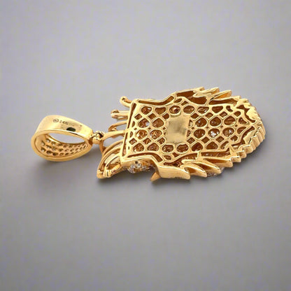 Back of lion pendant in yellow gold with 14K stamp