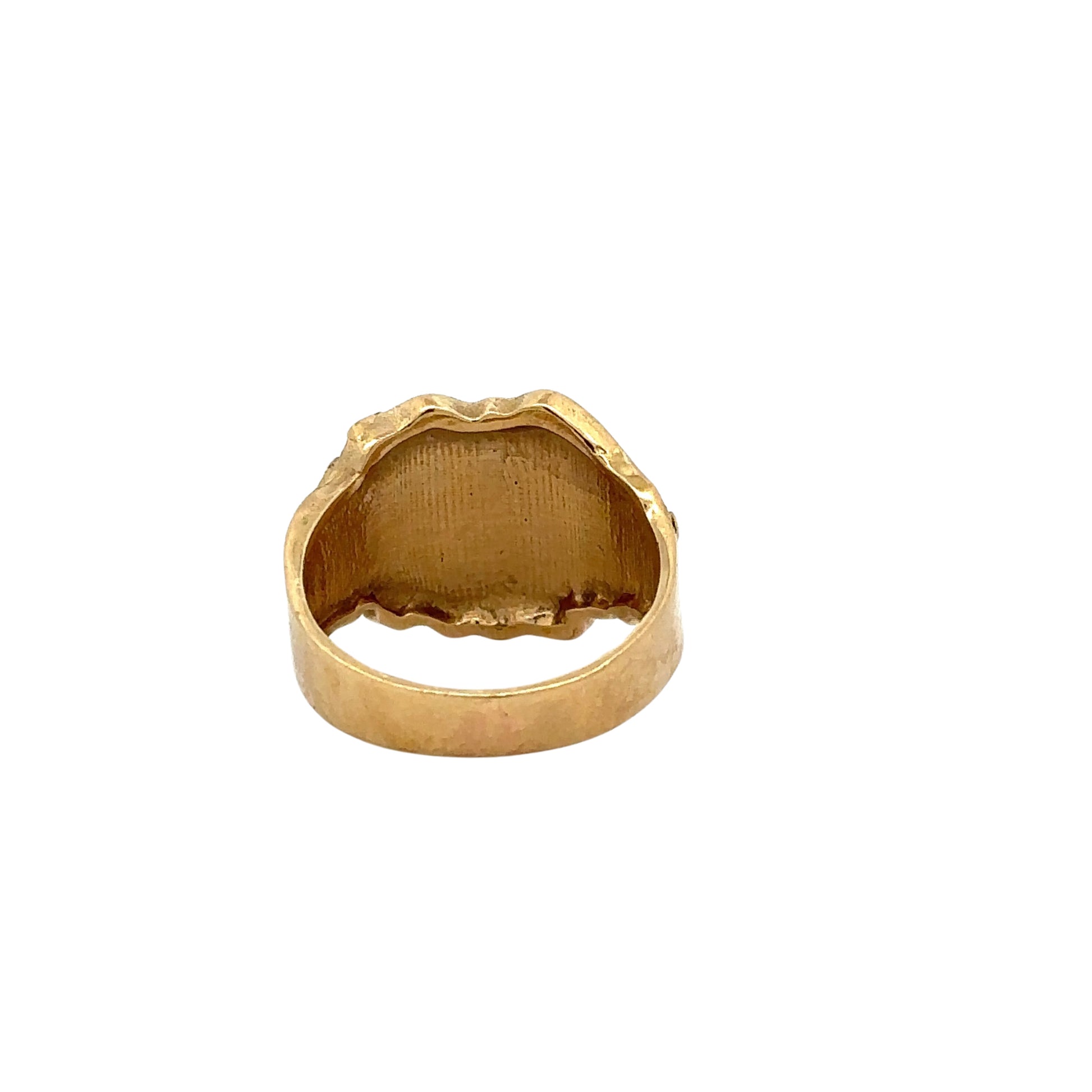 Back of yellow gold nugget ring showing scratches 
