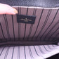 Close up pocket with Louis Vuitton label