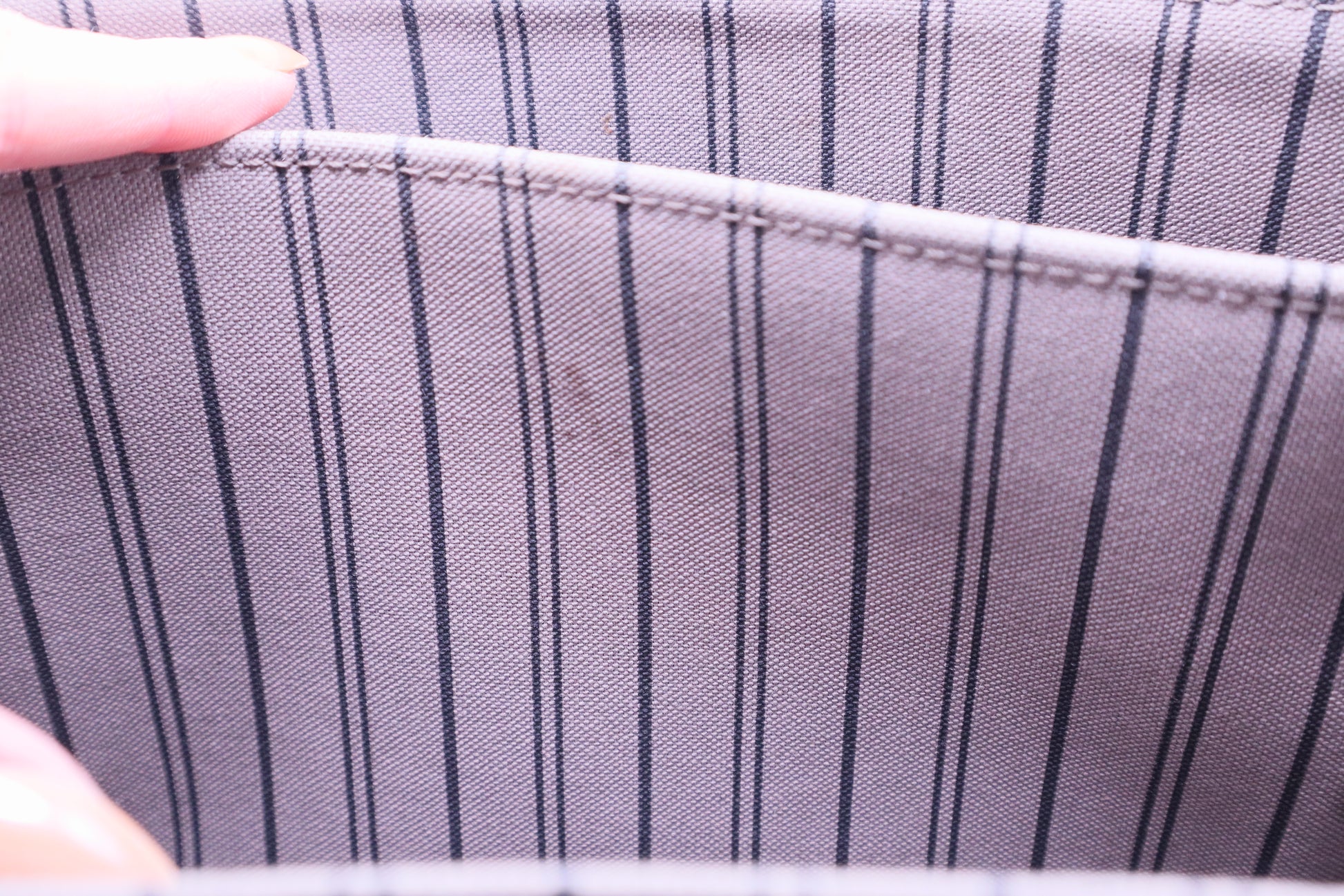 Inner pocket with small stain