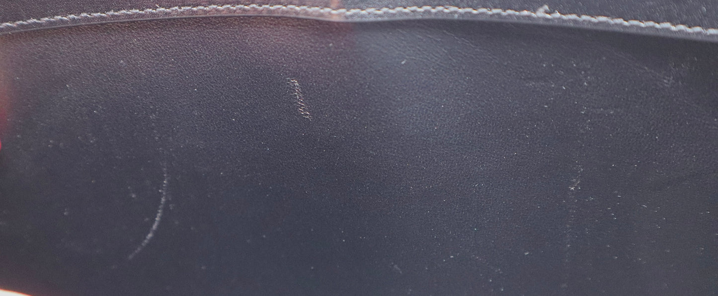 Scuff marks shown on inside of bag