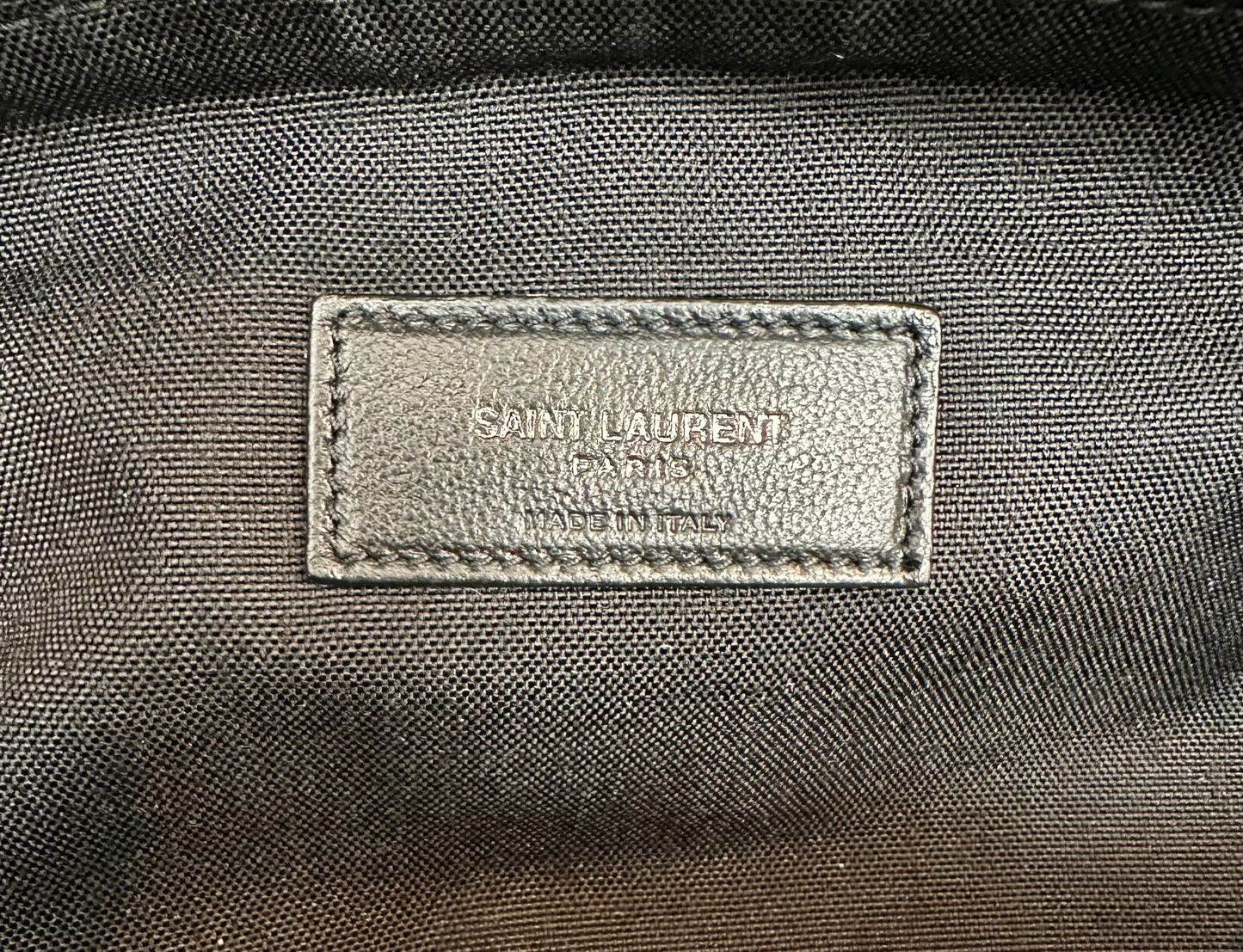 Close up of Saint Laurent tag inside