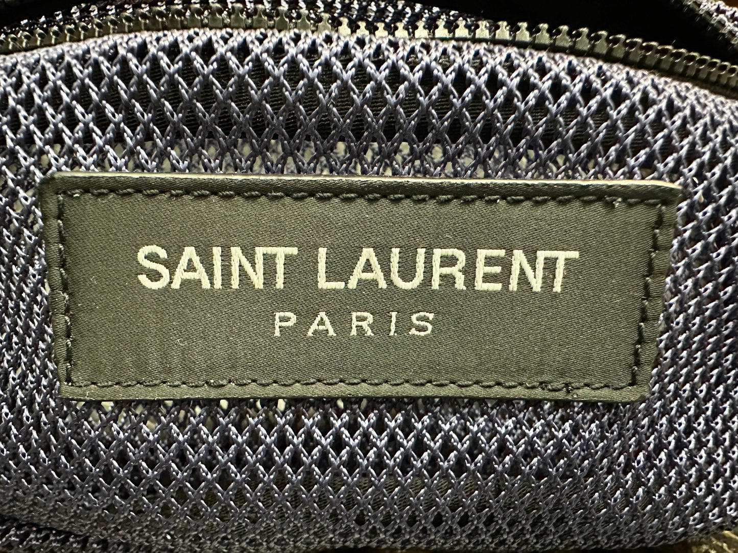 Close up of Saint Laurent exterior tag