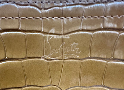 Christian Louboutin stamp on outside of purse