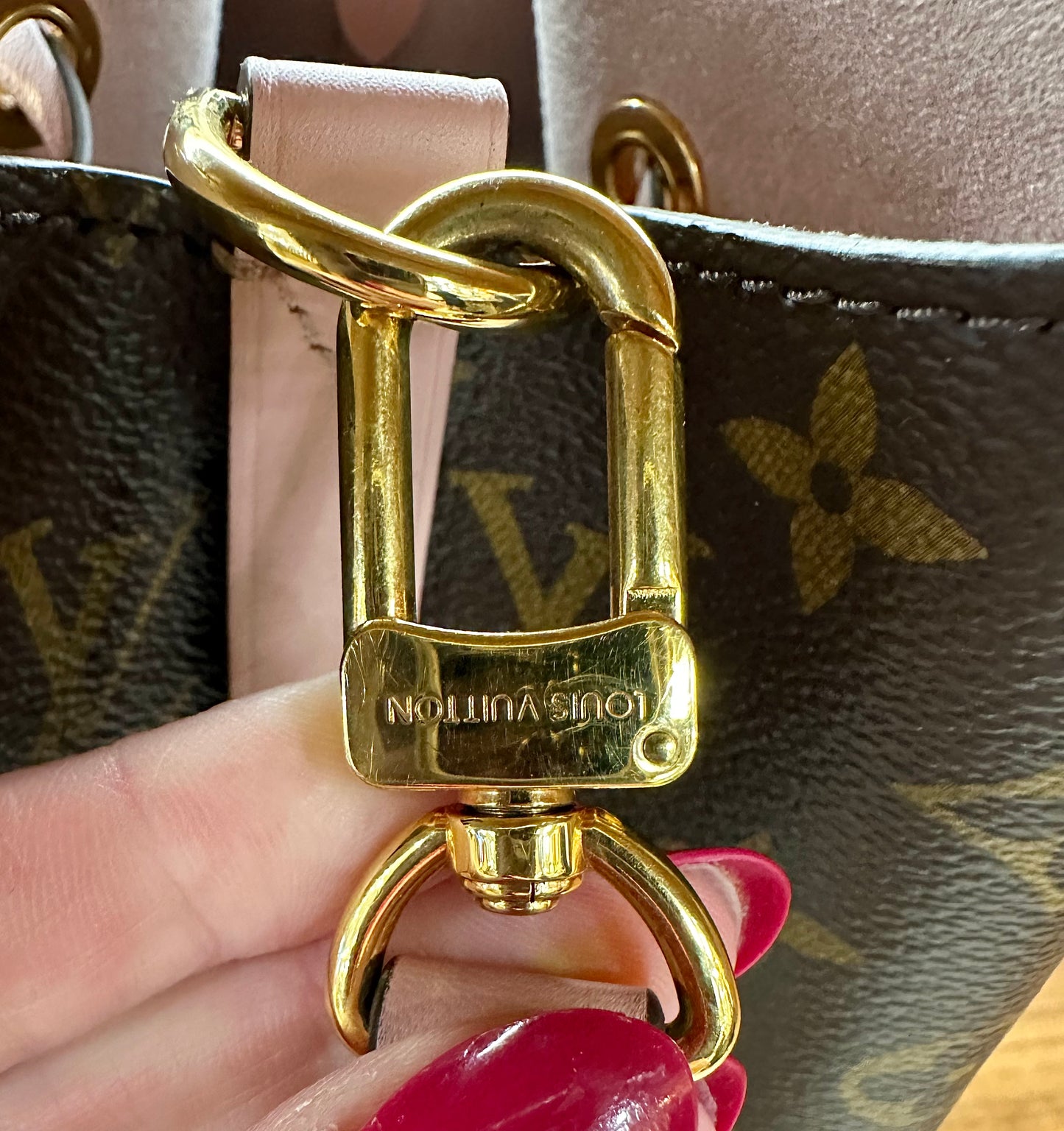 Louis Vuitton Brass detailing with scratches