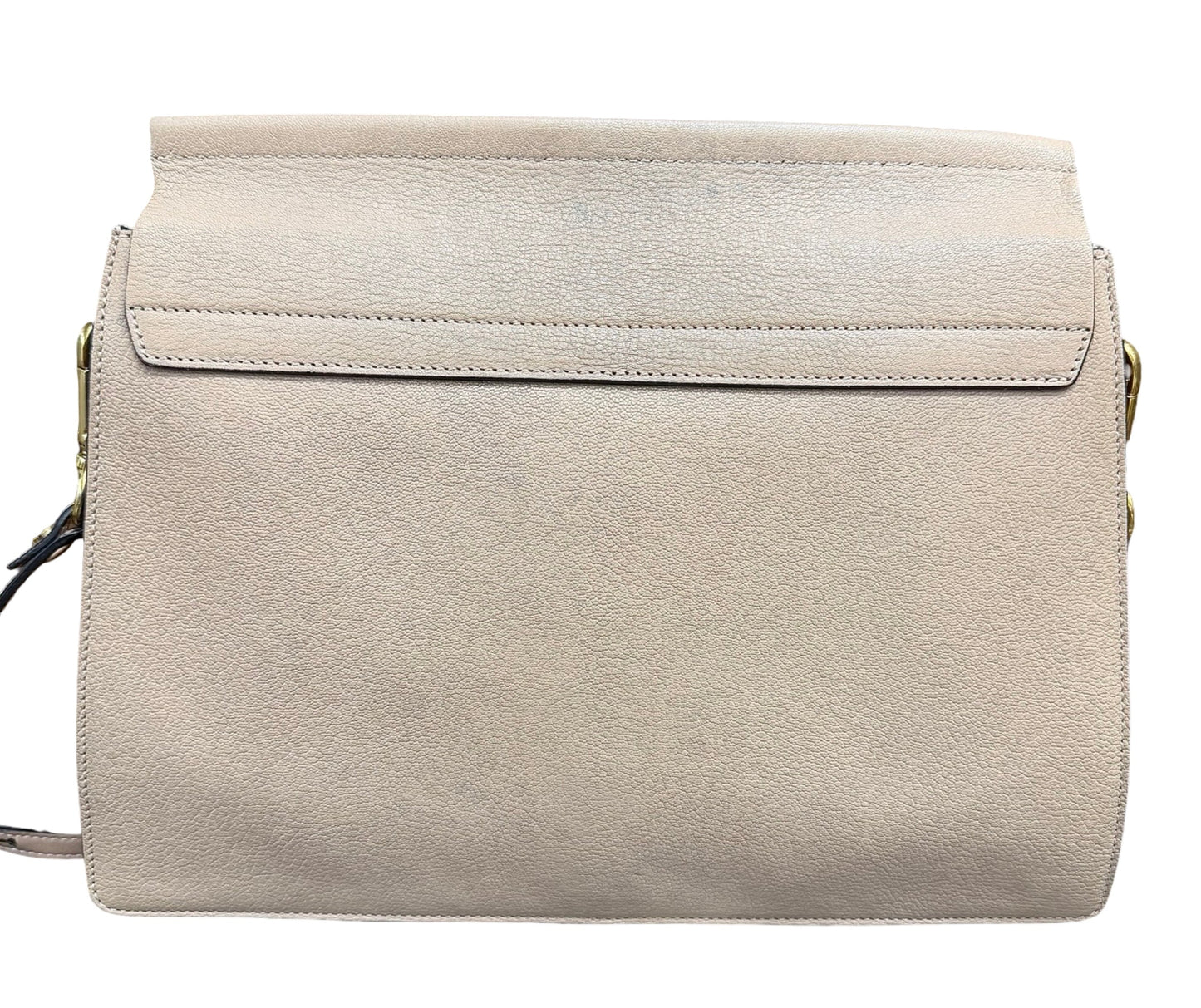 A light beige leather shoulder bag with a flap closure and gold-tone hardware, shown against a plain white background.