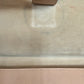 Close up of interior with discoloraqtion under the button closure