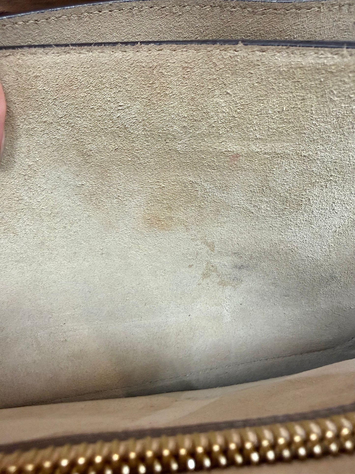Close up of staining on suede interior