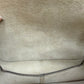 Discoloration, minor staining, and wear on suede interior