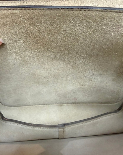Discoloration, minor staining, and wear on suede interior