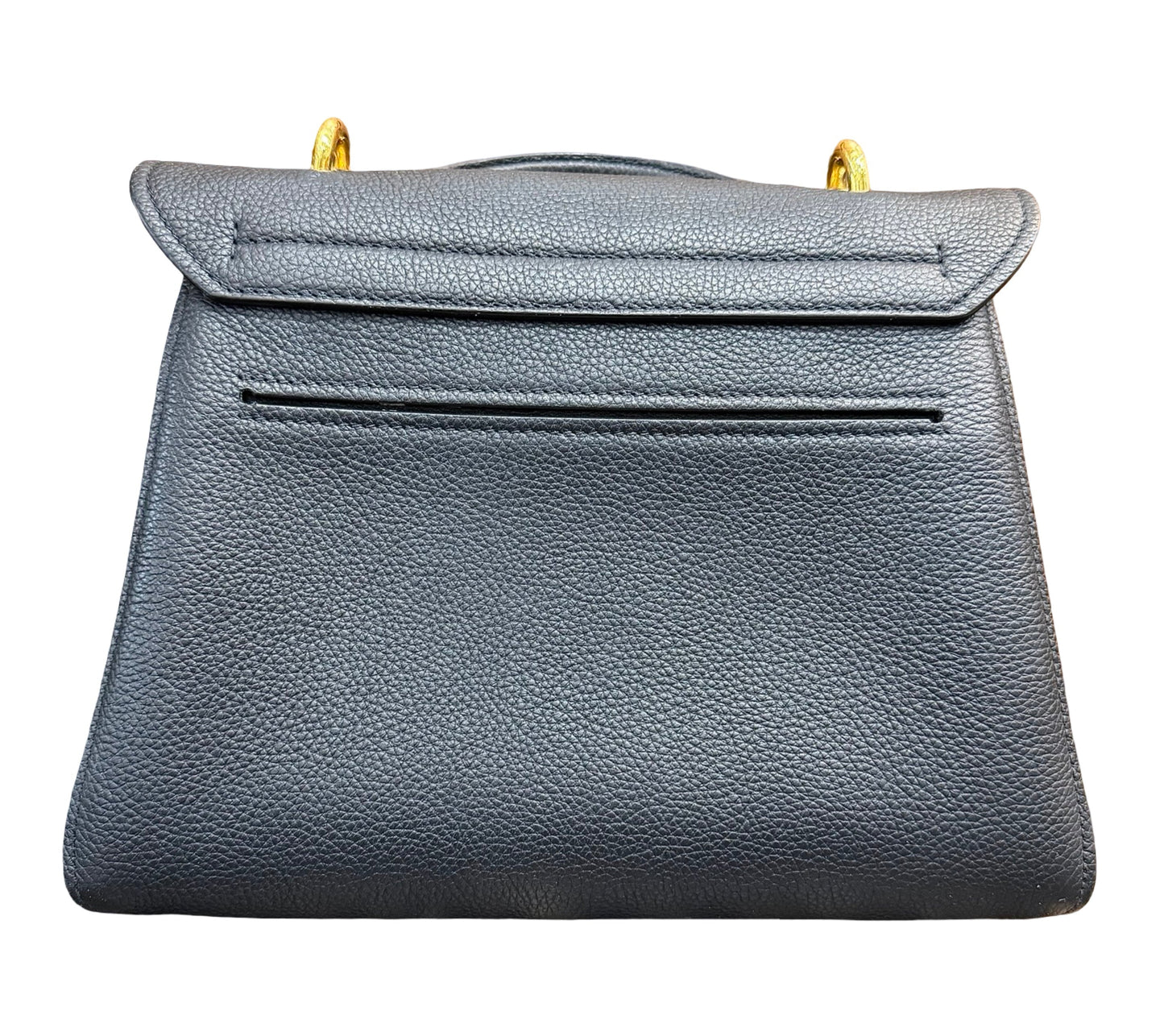 Back of a black pebbled leather handbag with gold-tone hardware, against a plain white background.