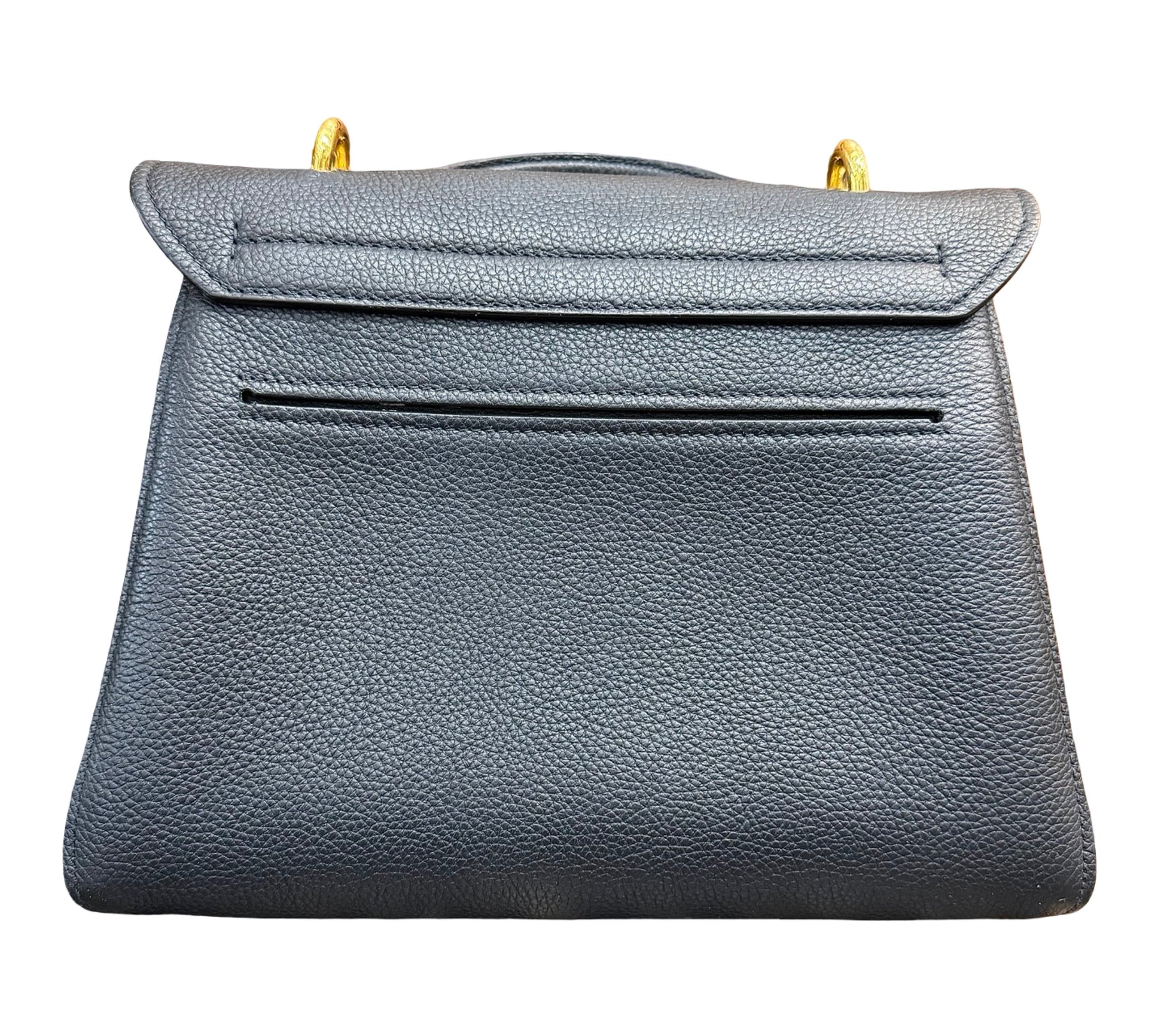 Back of a black pebbled leather handbag with gold-tone hardware, against a plain white background.