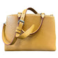 A structured brown epi leather handbag with a top handle, shoulder strap, and silver-tone hardware, shown against a plain white background. The strap is misshaped at the end.