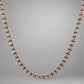 Diamond necklace on a gray background