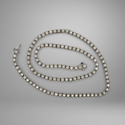 Diamond tennis necklace on a gray background