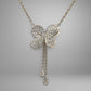 Butterfly-shaped diamond pendant on a chain against a gray background