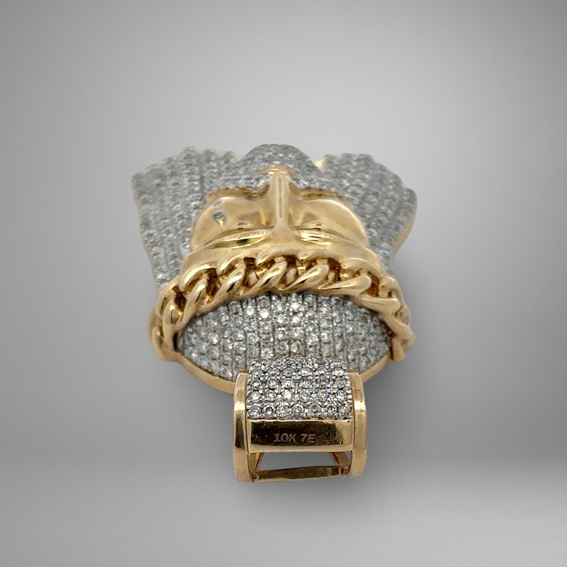Gold and diamond pendant with 10K stamp