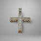 Diamond cross pendant on a gray background