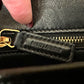 Close up of zipper with Saint Laurent embossed