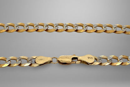 Gold chain on a gray background