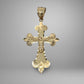 Gold cross pendant with detailed design on a gray background