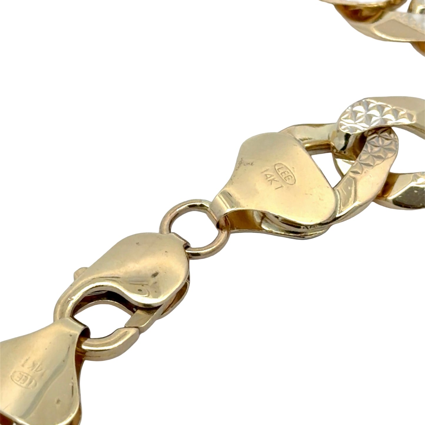 Close up of 14K stamp on lobster clasp on white background