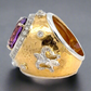 The side of the amethyst ring. Shows the 18K yellow gold and small diamonds. Some scratches shown.